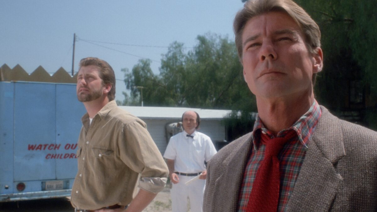 Troje mężczyzn na ulicy.