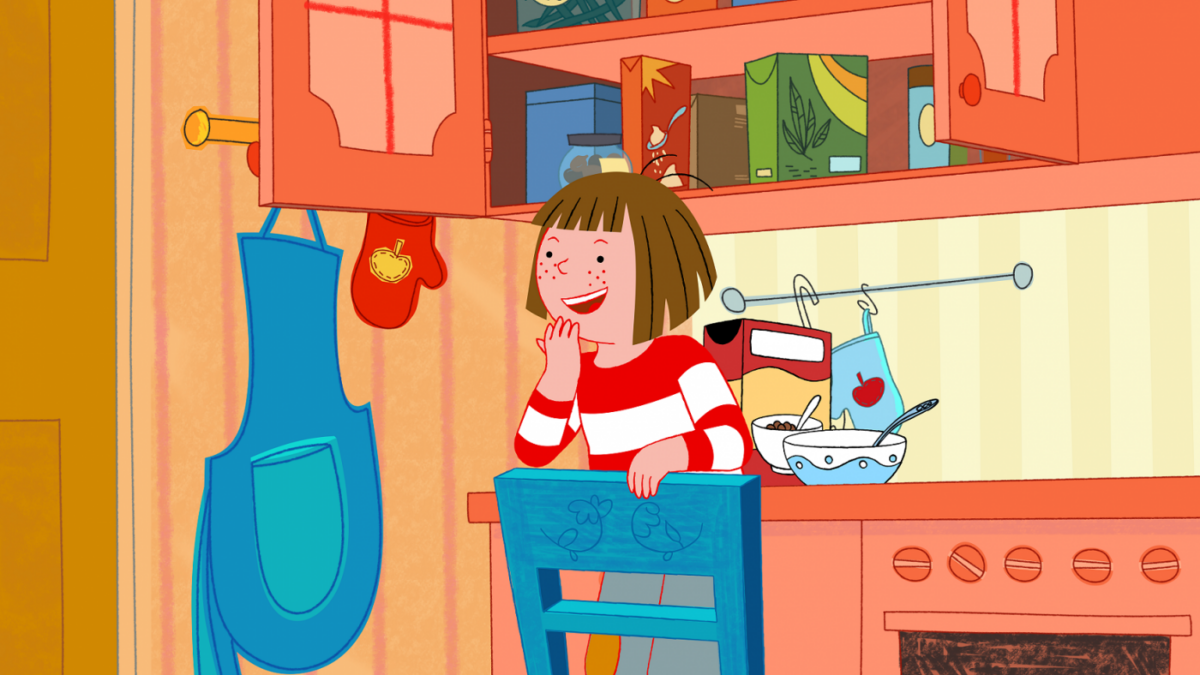 Basia w kuchni ucząca się gotować.