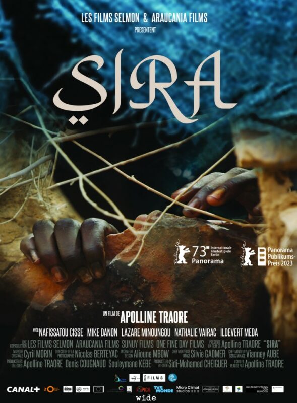 Plakat przedstawia dłonie czarnoskórej osoby trzymające kamiennego głazu.