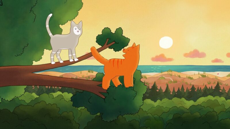 Kadr z bajki, dwa kotki spacerujące na dworze.