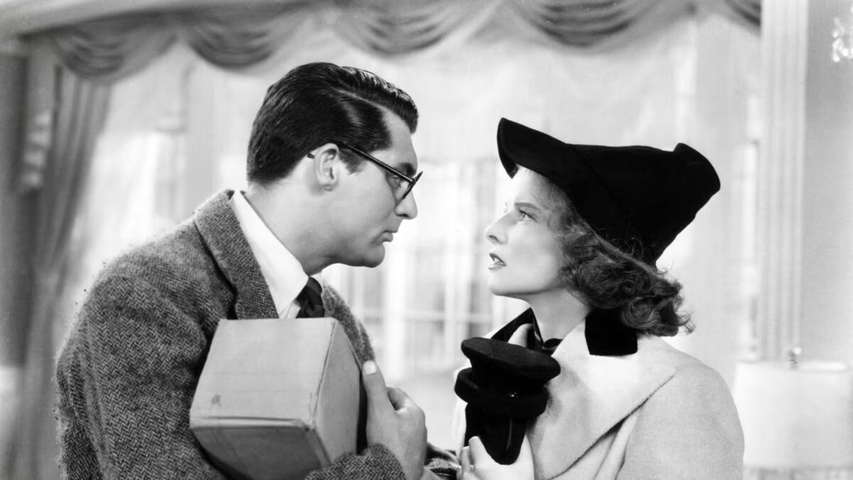 Mężczyzna wpatrzony w młodą kobietę.